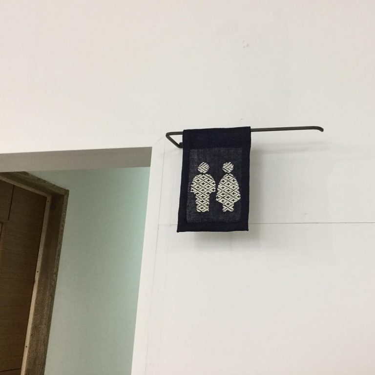 新しい十和田の場 14-54 オープン！ 南部地方ならではのサインをデザインしました #トイレ #サイン #sign #14-54 #十和田 #南部菱刺し #つづれや #山田友子 #字と図 #青森 #デザイン #施設設計は渡部環境設計事務所 #現代美術館のリーディングルームでもある